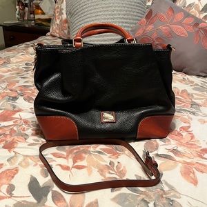 Gently used black pebble leather with brown trim